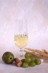 Image showing A glass of white wine