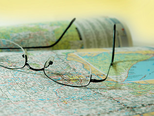 Image showing Road map and glasses