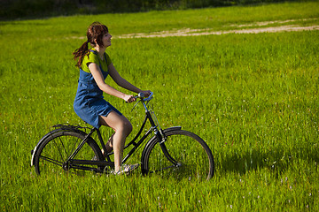 Image showing Riding a bicycle