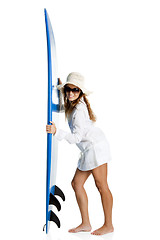 Image showing Woman with a surfboard