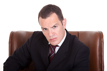 Image showing Businessman upset seated on a chair