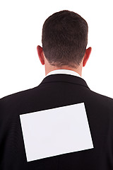 Image showing back of businessman, with a paper