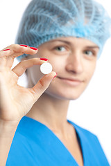 Image showing smiling doctor and pill