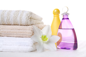 Image showing shampoo, towels and aromatic oil, 