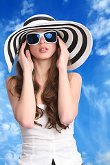 Image showing pretty woman in striped hat