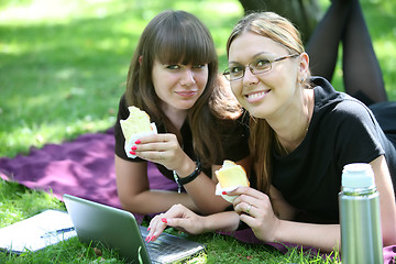 Image showing two businesswoman with laptop