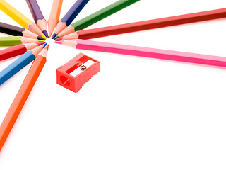 Image showing Multicolor pencils and red sharpener