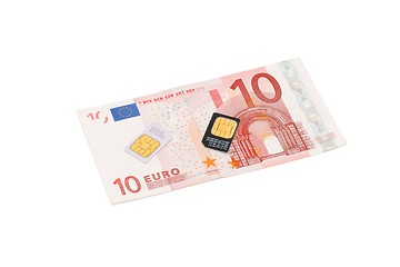 Image showing Two SIM cards for cellular phones on euro bill