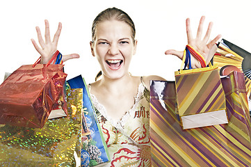 Image showing exalted woman with shopping bags