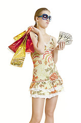 Image showing shopper girl running short on cash