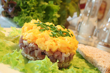 Image showing Scrambled eggs with ham