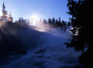 Image showing Mountain waterfall in sunshine