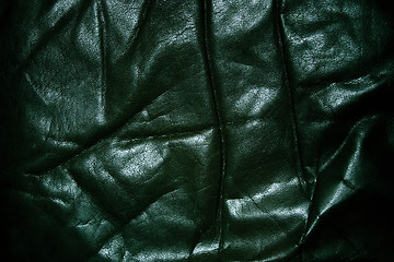 Image showing Wrinkled old black leather