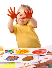 Image showing Cute child paint using hands