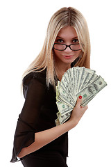 Image showing Girl with a fan of dollar bills