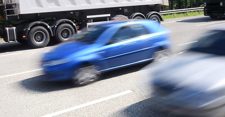 Image showing  blurred cars