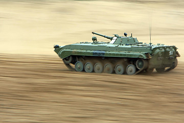Image showing  tank rides on the field