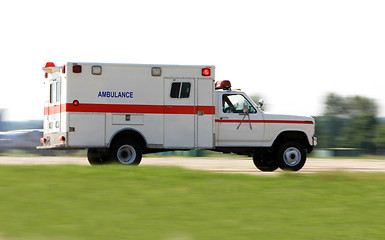 Image showing Ambulance driving fast