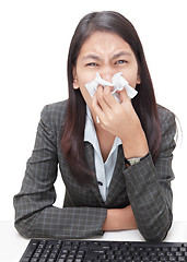 Image showing Sneezing businesswoman w flu