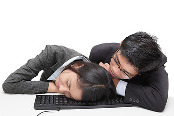 Image showing Sleeping office workers