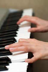 Image showing hands playing the piano