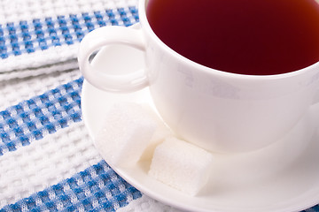 Image showing cup of tea and some sugar