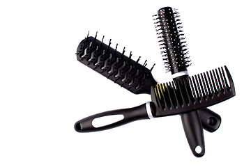 Image showing three hairbrushes