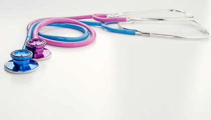 Image showing pink and blue stethoscopes