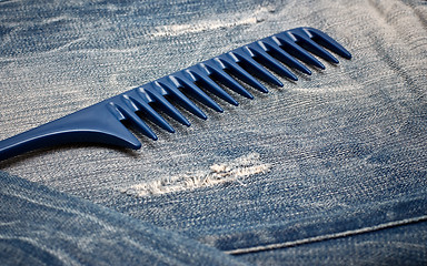 Image showing Comb on the jeans 