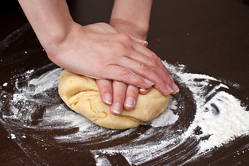 Image showing Preparing bread