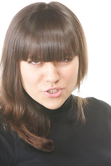 Image showing Angry brunette in black