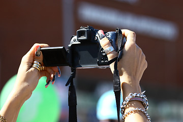 Image showing Camera in women's hands