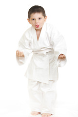 Image showing Little karate kid in threatening pose