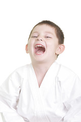 Image showing Laughing little karate kid