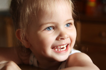 Image showing Llittle girl happily smiling