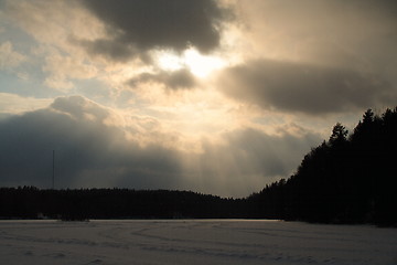 Image showing Evening sun over frozen lake