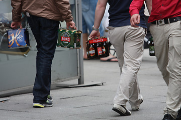 Image showing Walking with beer