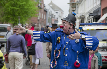 Image showing Clown Bluey performing