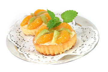 Image showing Mandarin tartlet with lemon balm