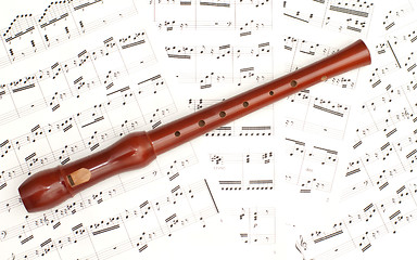 Image showing Classical sheet music and flute