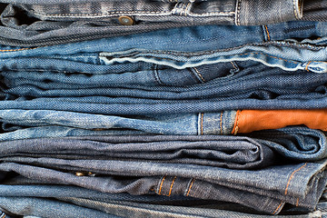 Image showing Stack of  blue jeans