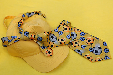 Image showing Yellow Baseball Cap and Necktie