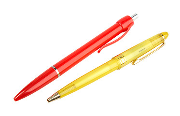 Image showing Yellow and red ball point pens.