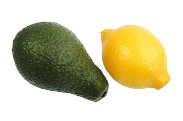 Image showing Green avocado and yellow lemon.