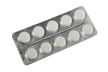 Image showing White pills in metallic blister.