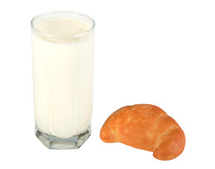 Image showing Milk in transparent glass and yellow-orange bagel.