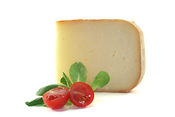 Image showing Piece of cheese with tomato