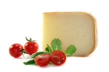 Image showing Piece of cheese with tomatoes