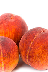 Image showing three peaches