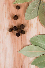 Image showing aromatic pepper and bay leaves